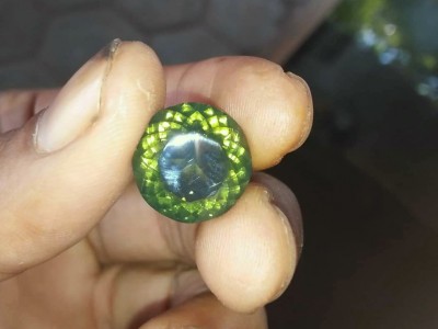Faceted transparent green opal