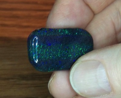Theyt said this was part of a parcel of Fairy Opal, it looks like it could be that, or even concrete or rainbow opal.  Its for sure matrix opal...lol...