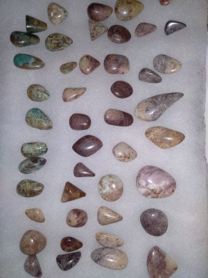 Pegmatite vein, feldspar quartz + copper, iron &amp; silver.